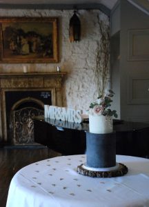 Buttercream wedding cake tall two tier grey and white