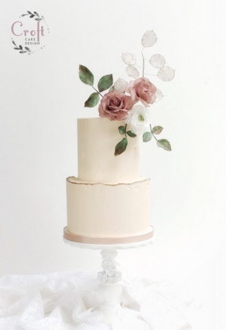 Elegant buttercream wedding cake two tier wafer paper flowers