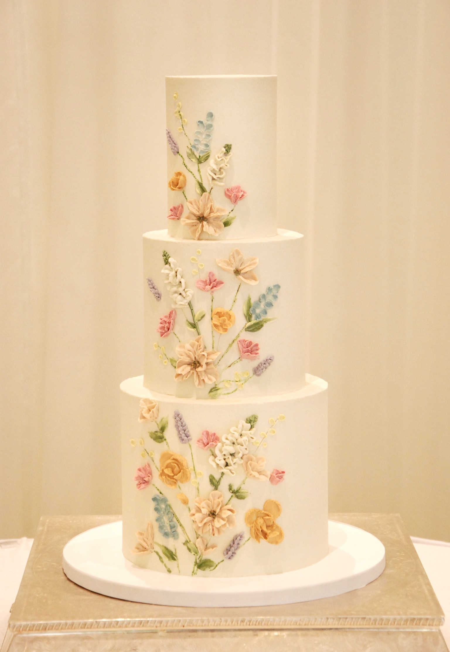 Cottage garden wedding cake buttercream flowers